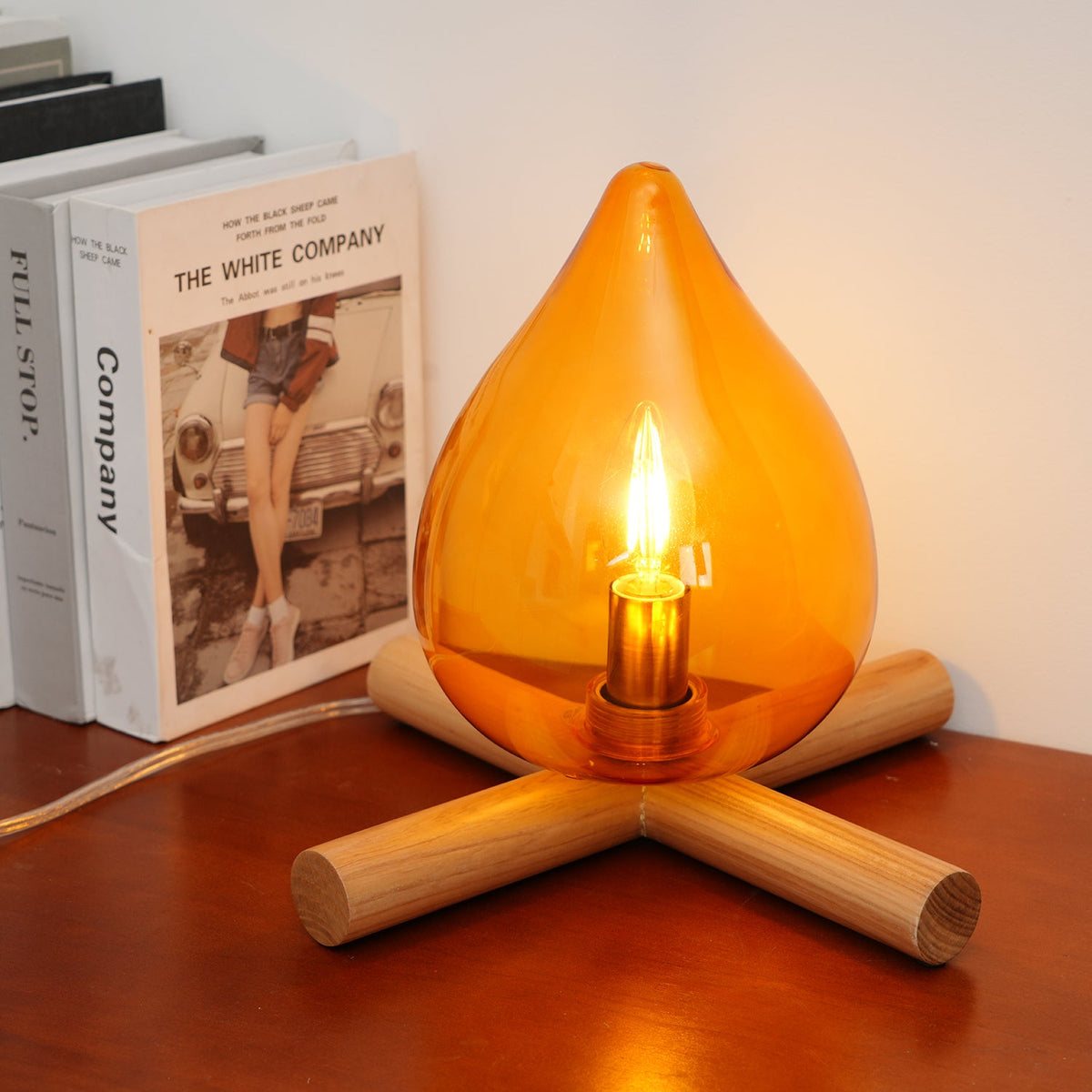 Flame-Inspired Glass Table Lamp With Wooden Cross Base