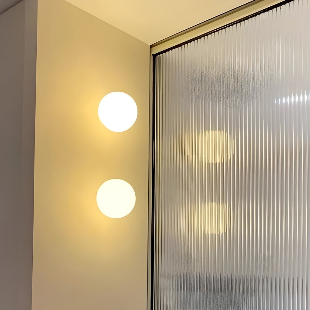 Minimalist Frosted Glass Globe Wall Light with Soft Diffused Glow for Bedroom