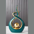 Modern Abstract Ceramic Sculpture with Gilded Swirl and Sphere for Shelf Decor