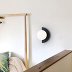 Modern Glass Globe Wall Light with Colourful Semicircle Backplate