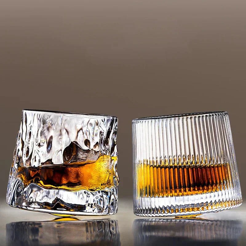 Rotating Whisky Glass with Textured Tilted Base for Swirling Spirits