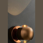 Round LED Wall Light with Up and Down Beam | Modern Metal Globe Wall Sconce