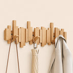 Solid Wood Wall Mounted Coat Rack with Fold Down Hooks and Staggered Slats