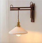 Swing Arm Wooden Wall Light with Pleated Ceramic Shade and Brass Holder